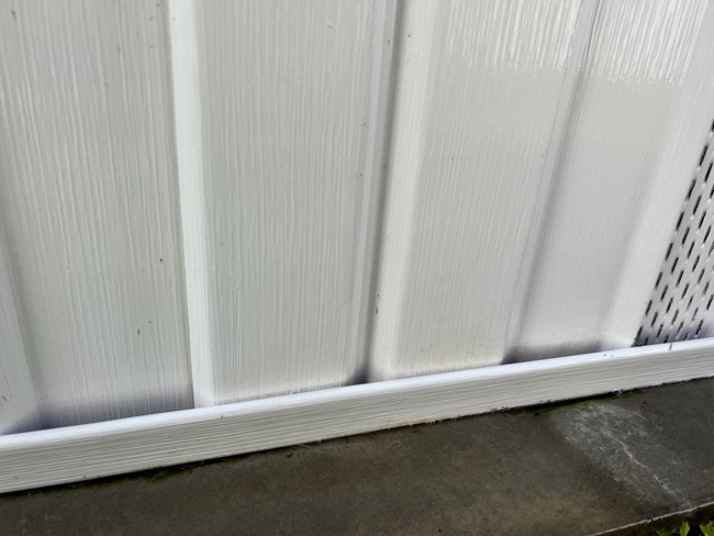 Vinyl planks and concrete after cleaning with Marine 31 Mildew Stain Remover